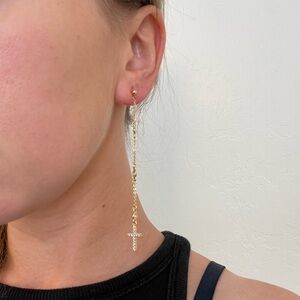 Dangling gold cross earrings Vanessa Mooney